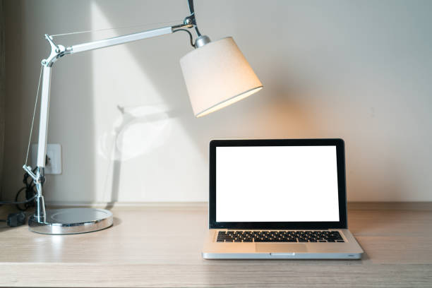 istock Laptop on a desk with lamp 1133226992