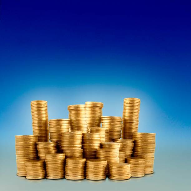 istock Coins and stacks of money 1133228959
