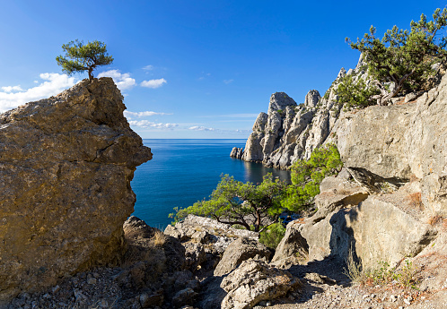 Coastal cliffs. Novyy Svet, Crimea. Sunny morning in September.