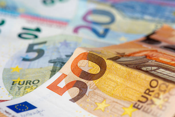 Euro banknotes 5, 10, 20 and 50 euro banknotes. Close-up view euro symbol stock pictures, royalty-free photos & images