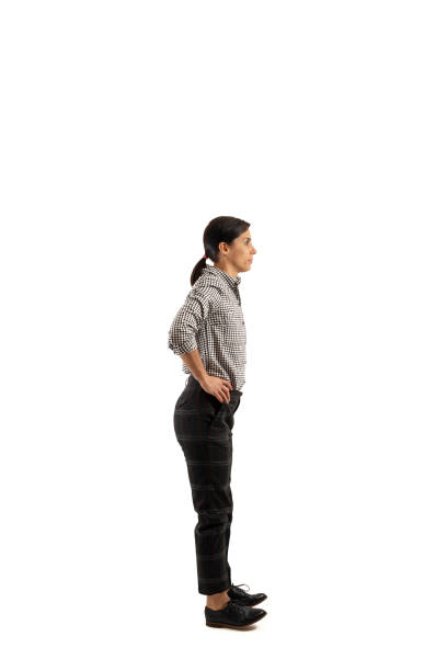 istock Young businesswoman isolated on white background doing exercises 1133238761