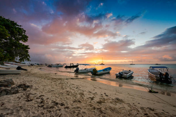 istock Boats anchored during a dramatic and beautiful sunset 1133239553