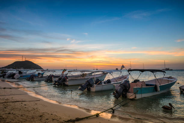 istock Boats anchored during a dramatic and beautiful sunset 1133239638