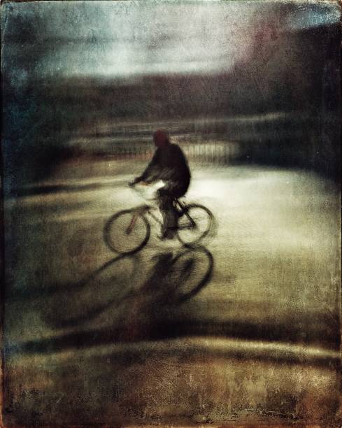 istock Blurred motion textured view of the cyclist on the road 1133239843