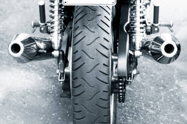 istock Closeup rear view of motorcycle, black and white, copy space 1133240244