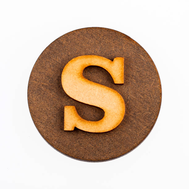 istock Letter S on a wood circle - Alphabet 1133242342