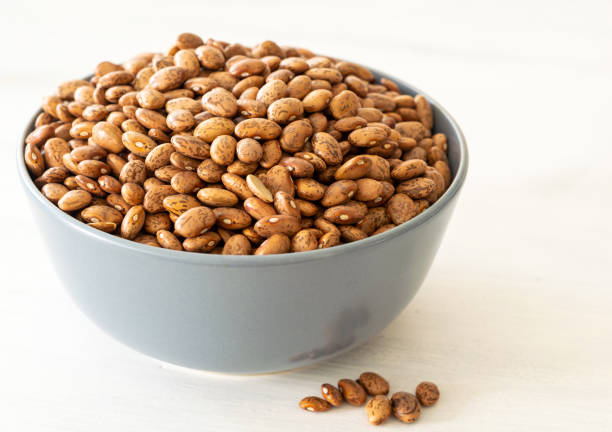 istock Beans in a bowl on bright background 1133244437