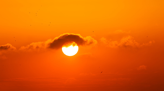 Bright big sun on the sky with yellow orange red gradation colors, 200mm  teleconverter×2.