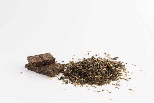 istock Pile of green tea isolated on white background 1133248318