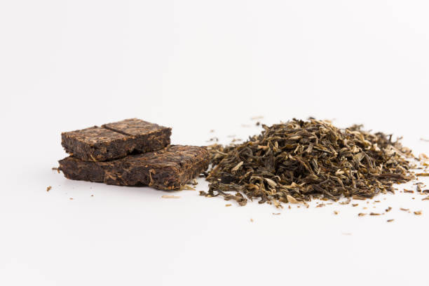 istock Pile of green tea isolated on white background 1133248320