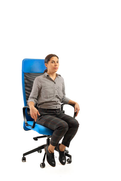 istock Woman doing exercises while sitting on the office chair, isolated on white 1133249674