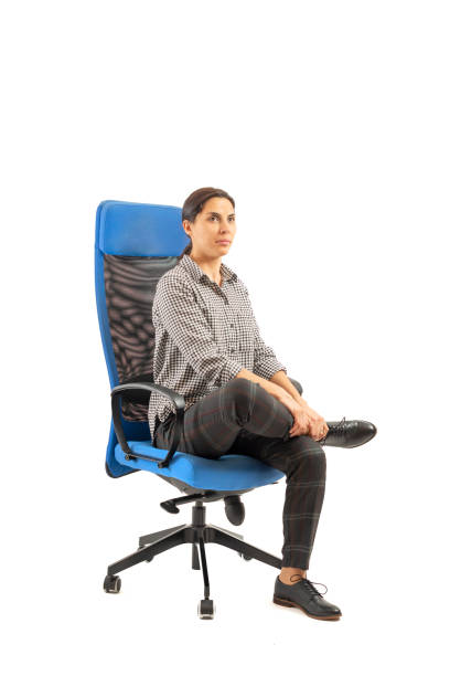 istock Woman doing exercises while sitting on the office chair 1133249899