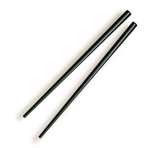 istock Chopsticks. Wooden chopsticks isolated on white background. 1133251335