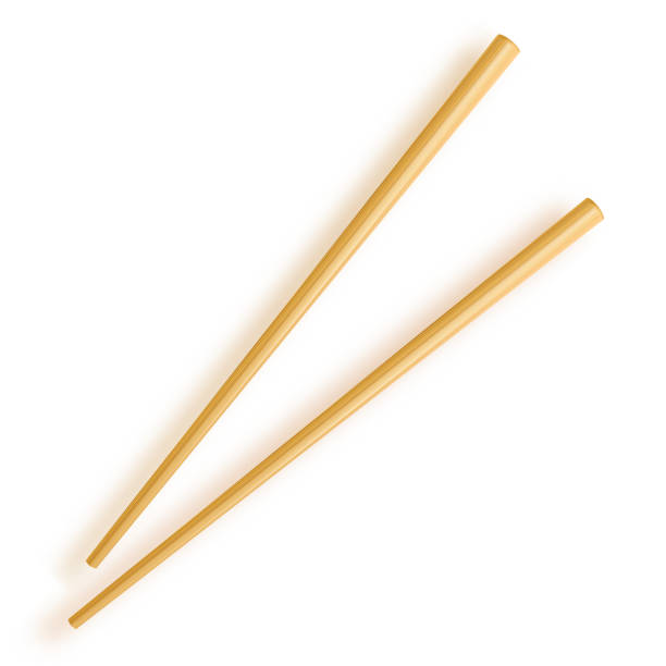 istock Chopsticks. Wooden chopsticks isolated on white background. 1133251445