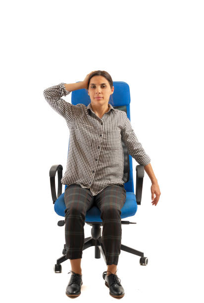 istock Woman doing exercises while sitting on the office chair 1133251496
