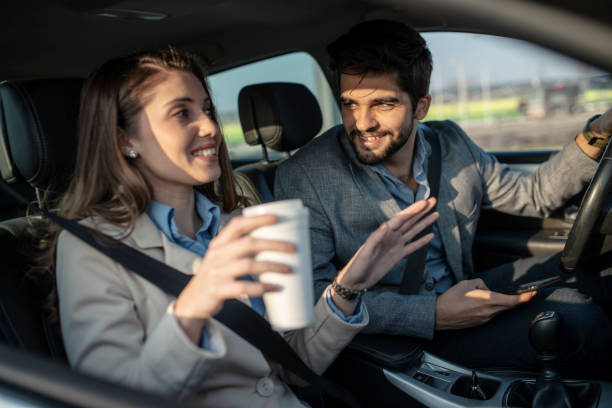 istock Business couple driving a car 1133252828