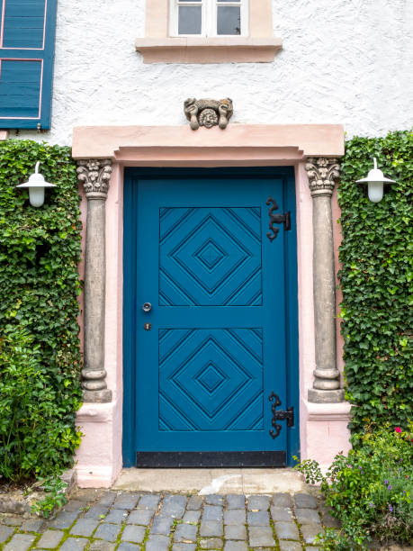 istock Beautiful blue door with decorative columns at Blankenheim, Germany 1133263625