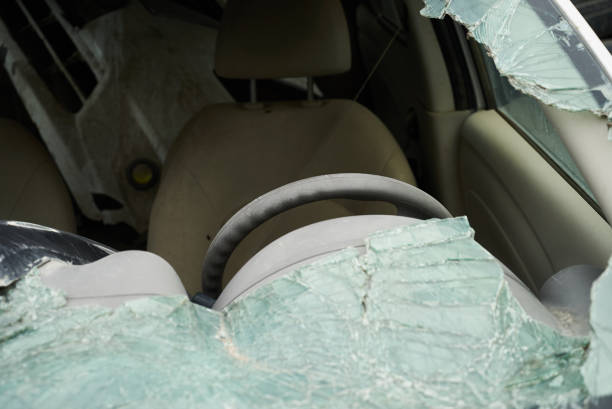 istock Broken car windshield, closeup. Damaged vehicle after car crash 1133263663