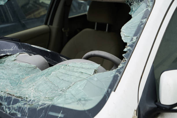 istock Broken car windshield, closeup. Damaged vehicle after car crash 1133263664