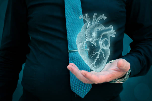 istock man holding heart in his hand futuristic 1133264577