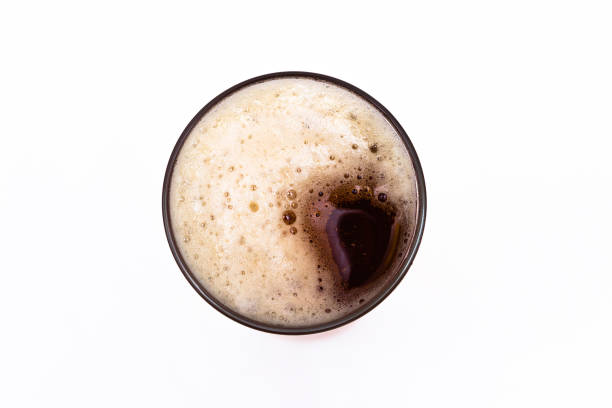 istock beer glass isolated on white background, top view. 1133264784