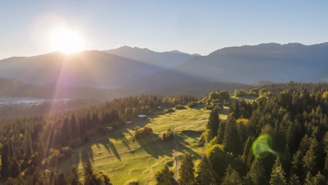 Sunrise Mountains Above Nature Field Switzerland Aerial 4k