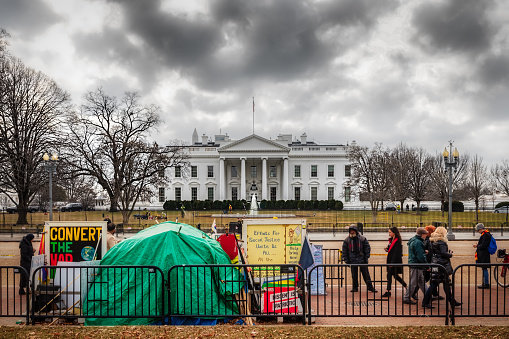 Wasington, District of Columbia - January 11: Protestors sit at the tents in front ot the White House on January 11, 2018 in Washington.