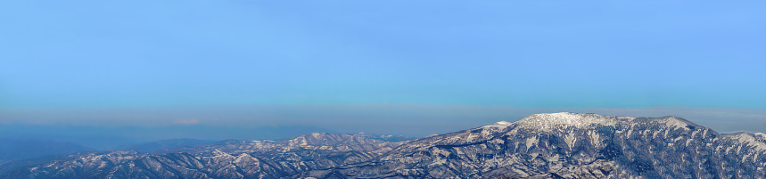 Austrian alps panorama. Snowy hill peak.