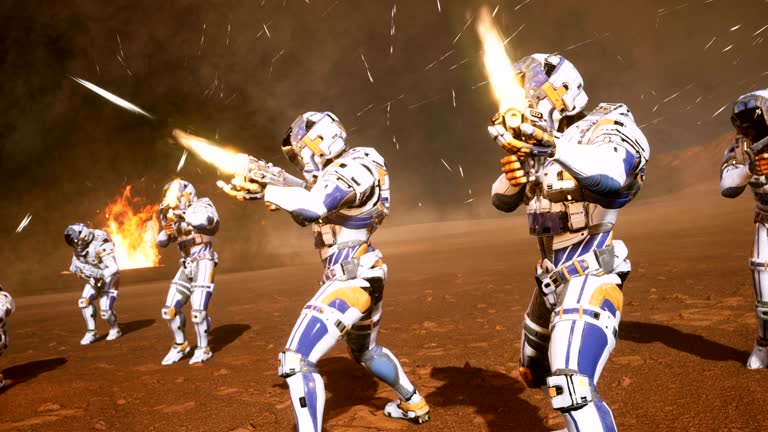 The commander and his soldiers of the future attack the enemy in the smoke in the middle of explosions on an uncharted planet.