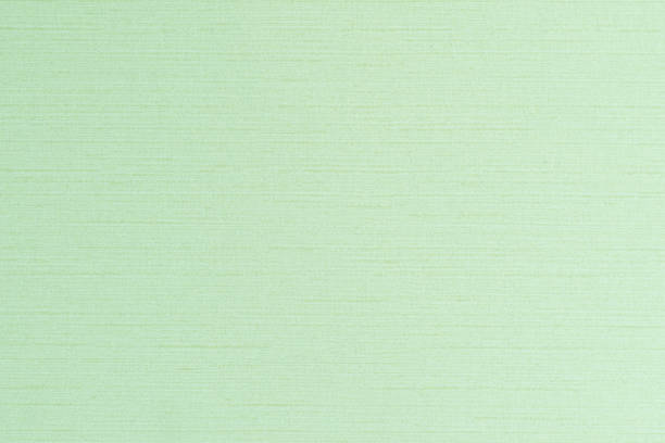 istock Blended cotton silk fabric textile wallpaper detailed texture pattern background in light yellow lime green color 1133275296