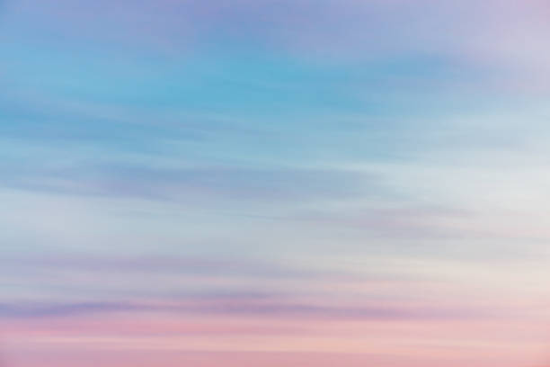 istock Sunset sky with pink violet light clouds. Colorful smooth blue sky gradient. Natural background of sunrise. Amazing heaven at morning. Slightly cloudy evening atmosphere. Wonderful weather on dawn. 1133276133