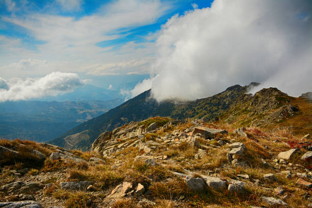 istock Mountain range in the clouds. Beautiful natural landscape 1133277439