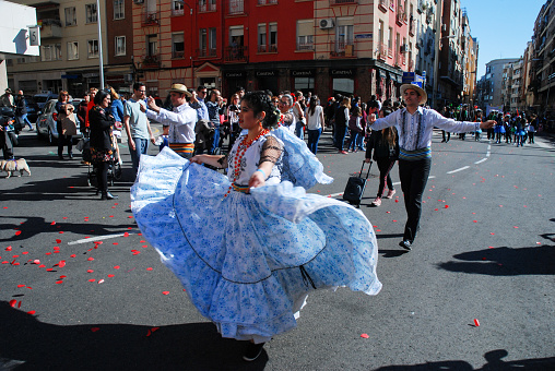 Madrid, Spain, March 2nd 2019: Carnival parade, members of Paraguayan dance group performing with traditional costume