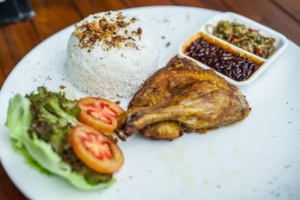 istock Traditional Fried Duck with Steamed Rice 1133301857