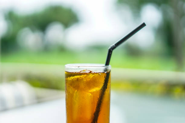 istock Lemon Tea with Garden Background 1133303102