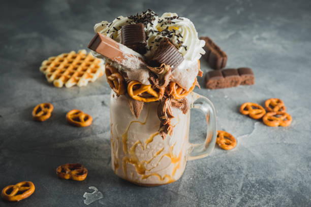 istock Sweet milkshake drink with dripping sauce, cookie and chocolate 1133303177