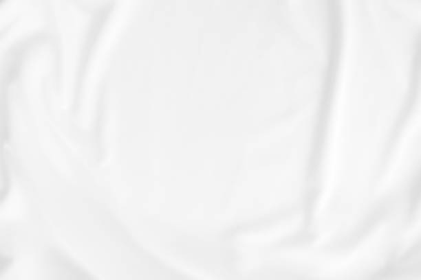 istock Abstract background. luxury cloth or liquid wave or wavy folds. White satin fabric texture wallpaper. 1133307812