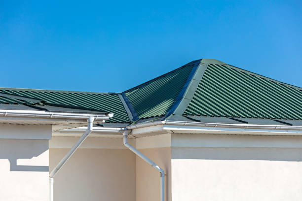 istock rooftop of house with metal rain gutter system against blue sky 1133309712