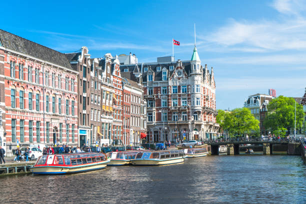 istock Typical Dutch Houses and Houseboat 1133315490