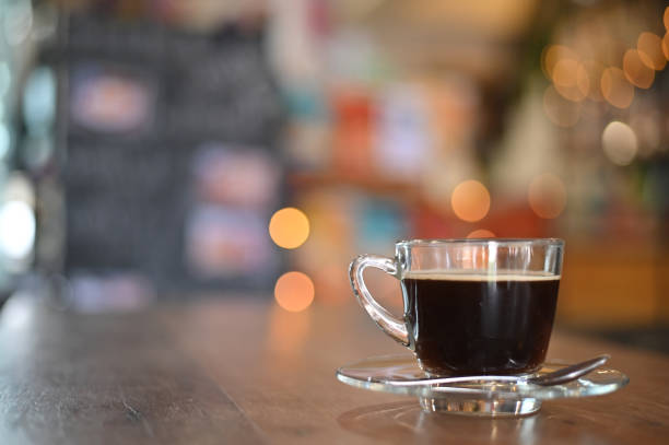 istock Coffee cup on wood table in cafe. 1133316547