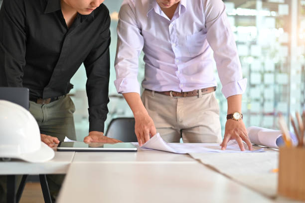 istock Architecture working achievement Planning Design Draw teamwork of architecture meeting. 1133318714