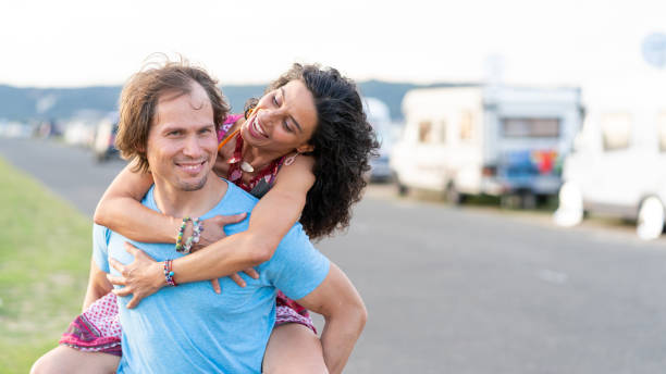 istock Couple enjoying romantic vacations walking on the road 1133320237