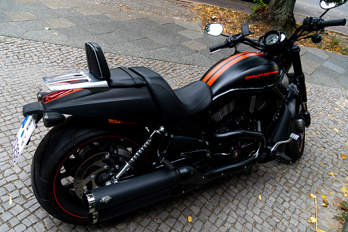 Berlin, Germany - August 25, 2018: Black Harley Davidson motorcycle. Harley-Davidson, or Harley, is an American motorcycle manufacturer, founded in Milwaukee, Wisconsin, in 1903