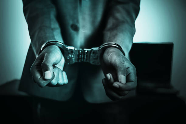 istock Business Man's hand in handcuff, crime arrested concept 1133324051