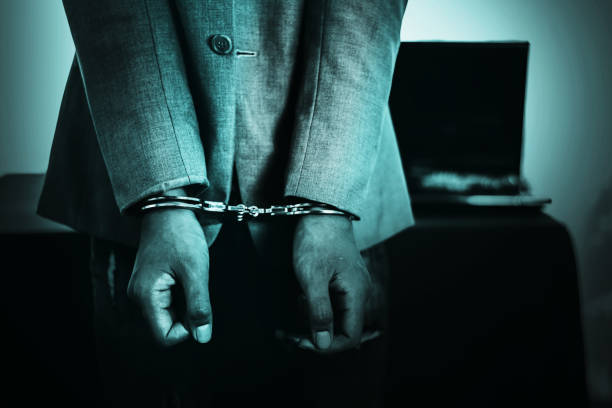 istock Business Man's hand in handcuff, crime arrested concept 1133324107