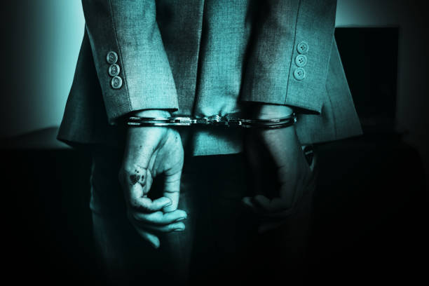 istock Business Man's hand in handcuff, crime arrested concept 1133324168