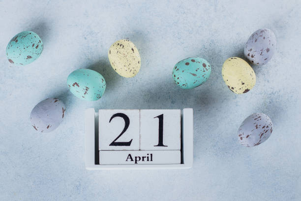 istock April 21. Image of april 21 wooden calendar on the light table background. Spring Easter Catholic Holiday Card. Pastel Colors Easter Eggs. Top view. Flat lay 1133325218