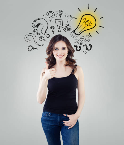 istock Happy woman with yellow lightbulb showing thumb up. Brainstorm, ideas, problem and solution concept 1133329097
