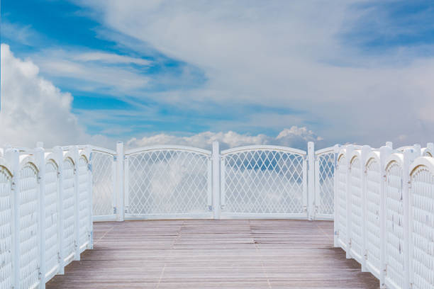 istock White balcony with perspective wood floor on sky background. 1133329108