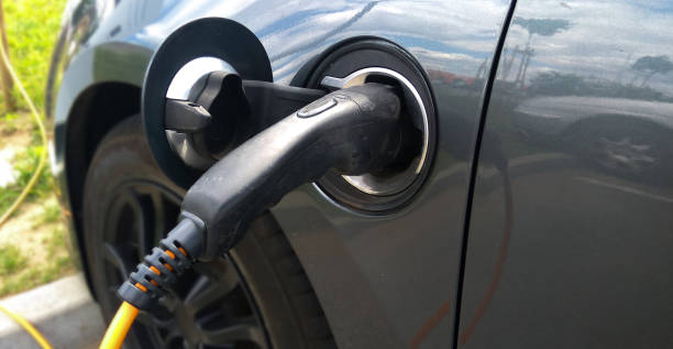istock Electric car charging on parking lot 1133330640